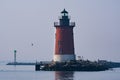 A red lighthouse in the Delaware Bay during the blue hour Royalty Free Stock Photo