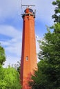 Red lighthouse on the Hel Peninsula at sunset. Poland Royalty Free Stock Photo