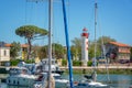 Red lighthouse and sailboats in the old harbor of La rochelle France Royalty Free Stock Photo