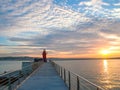 Red lighthouse and sunset on a beautiful summer day