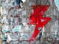 Red lightning on old grunge brick wall in polish city, as a symbol of women protest