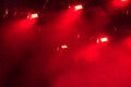 Smoke illuminated by red lights on stage Royalty Free Stock Photo