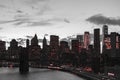 Red lights in black and white skyline scene of Lower Manhattan buildings in New York City Royalty Free Stock Photo