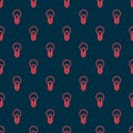 Red line Light bulb with concept of idea icon isolated seamless pattern on black background. Energy and idea symbol Royalty Free Stock Photo