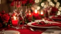 Red linens, elegant dinnerware, and romantic candlelight