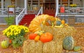 Red Lion Inn decorated with pumpkins, gourds, hay bales, Chrysanthemums in Fall Royalty Free Stock Photo
