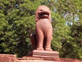 Red lion sculpture in temple in cambodia Royalty Free Stock Photo