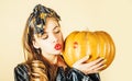 Red lip imprint on halloween pumpkin. Sensual kissing. Lipstick kiss print - beauty girl portrait. Lips pomade imprint Royalty Free Stock Photo