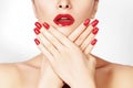 Red lips and bright manicured nails. open mouth. Beautiful manicure and makeup. Celebrate make up and clean skin Royalty Free Stock Photo