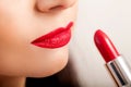 Red Lipstick. Closeup Of Woman Face With Bright Red Matte Lipstick On Full Lips. Beauty Cosmetics, Makeup Concept. High Resolution Royalty Free Stock Photo