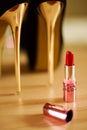 Red lipstick and high heel women shoes Royalty Free Stock Photo