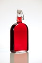 Red liquid in bottle