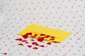 Red little hearts coming out from yellow envelope on valentine day background with copy space, loveletter concept Royalty Free Stock Photo