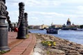 The red lock on the chain. The Neva embankment. Boats on the river