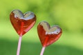 Red lollipops in heart shape