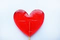 Red lollipops. Red hearts. Candy. Love and sweet concept. Valentine day. White background