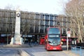 Red London Bus at Euston station by War Memorial