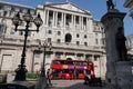 Red London bus outside the Bank of England in Threadneedle Street Royalty Free Stock Photo