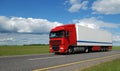 Red lorry with white trailer Royalty Free Stock Photo