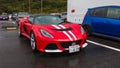 Red Lotus Exige series 3 in a parking lot