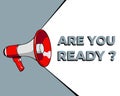 Red loudspeaker or megaphone announces ARE YOU READY in a speech bubble Royalty Free Stock Photo