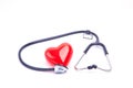 Red love heart and stethoscope on the table