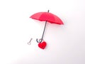 Red love padlock with key hanging on a red umbrella Royalty Free Stock Photo