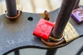 Red Love padlocks at the fence of clocktower of Church of St. Michael, Hamburg, Germany. A landmark of the city and it is