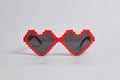 Red love pixel glasses on white background