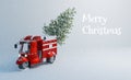 Red lovely car with Christmas tree in snow scene, merry Christmas and happy new year Royalty Free Stock Photo