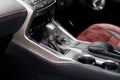 Red luxury car Interior with steering wheel, shift lever and air Royalty Free Stock Photo