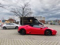 Red luxury Ferrari car parked in empty large German parking with UPS Royalty Free Stock Photo