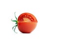 Red lying tomato with half cut Royalty Free Stock Photo