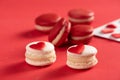 Red Macarons and red shaped hearten an envelope Royalty Free Stock Photo