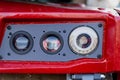Red machine panel with optical lenses and LED lighting system representing industrial sensor technology Royalty Free Stock Photo
