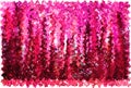 Red magenta monochrome mosaic wavy background. Wavy mosaic shapes point upward.