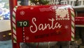 Red mailbox for Christmas letters. Santa mail. Christmas decorated mailbox for letters to Santa Claus. Xmas concept