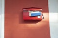 Red mailbox with documents overflowing Royalty Free Stock Photo