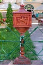 Red mailbox in front of the house