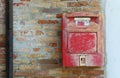 Red mailbox for posting letters Royalty Free Stock Photo