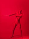 The red man drags something on a rope, a concept of labor and anxiety. Royalty Free Stock Photo