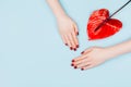 Red manicure and flower. Royalty Free Stock Photo