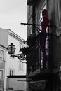 Red mannequin on the balcony. Lisbon. Portugal Royalty Free Stock Photo