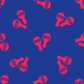 Red Maracas icon isolated seamless pattern on blue background. Music maracas instrument mexico. Vector Royalty Free Stock Photo