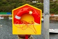 A red marine lifebuoy with a rope Royalty Free Stock Photo