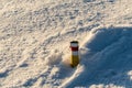 Hiking trail cairn with snow around in winter mountains in Slovakia