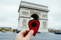 Red marker at the Arc de Triomph in Paris, France