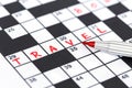 Red marker on Crossword - Travel Royalty Free Stock Photo