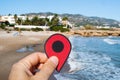 Red marker at del Moro beach in Alcossebre, Spain