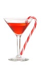 Red martini with a candy cane Royalty Free Stock Photo